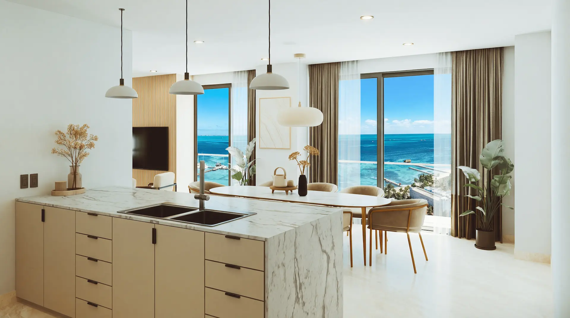 Cocina de diseño con isla de mármol y vista al mar en Dhamar Costa Mujeres