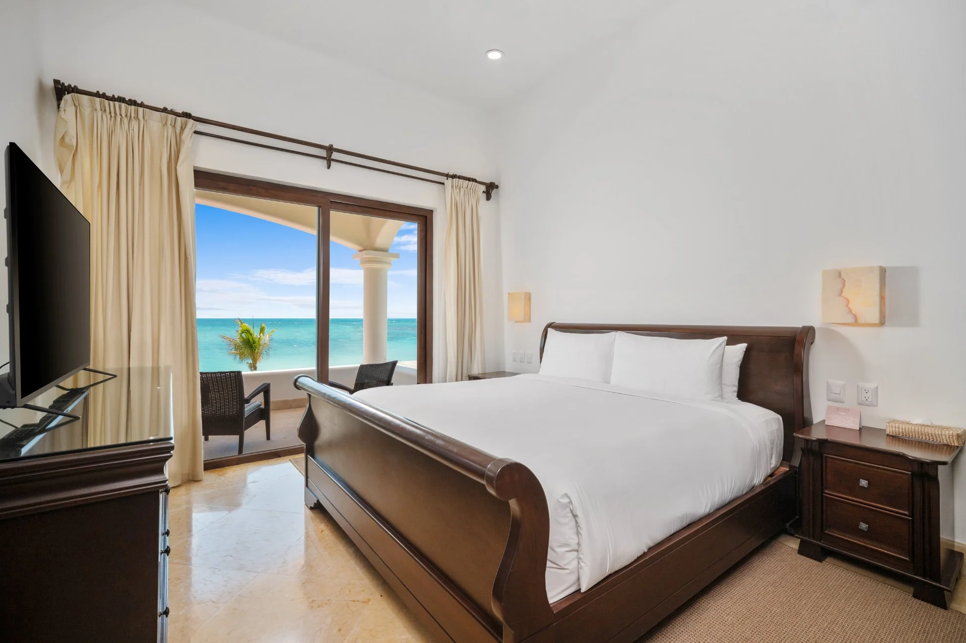 Suite with king bed and balcony with Caribbean Sea view at Hacienda Caracol villa, Riviera Maya