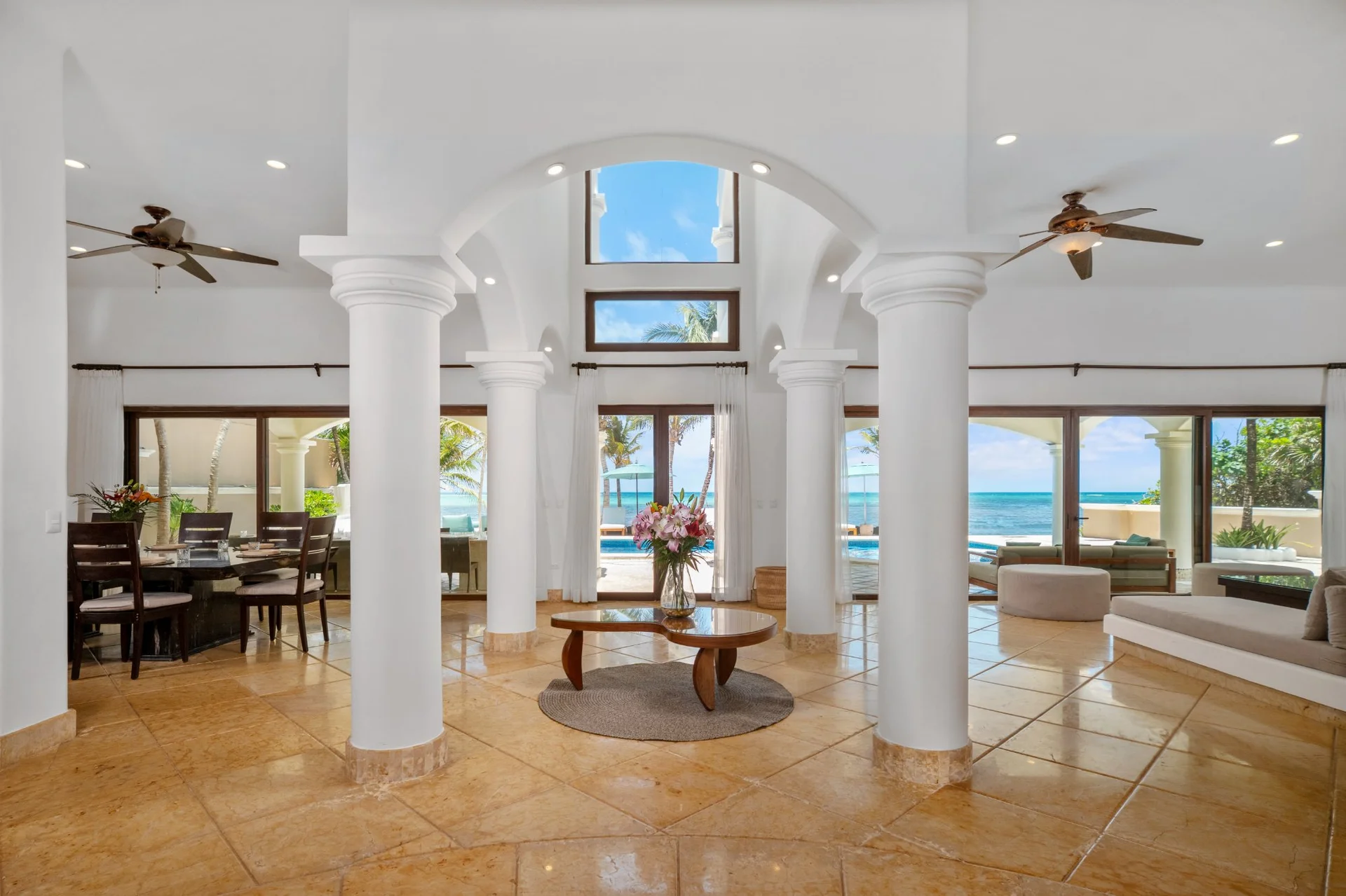 Main living room with columns and sea view at Hacienda Caracol villa, Riviera Maya