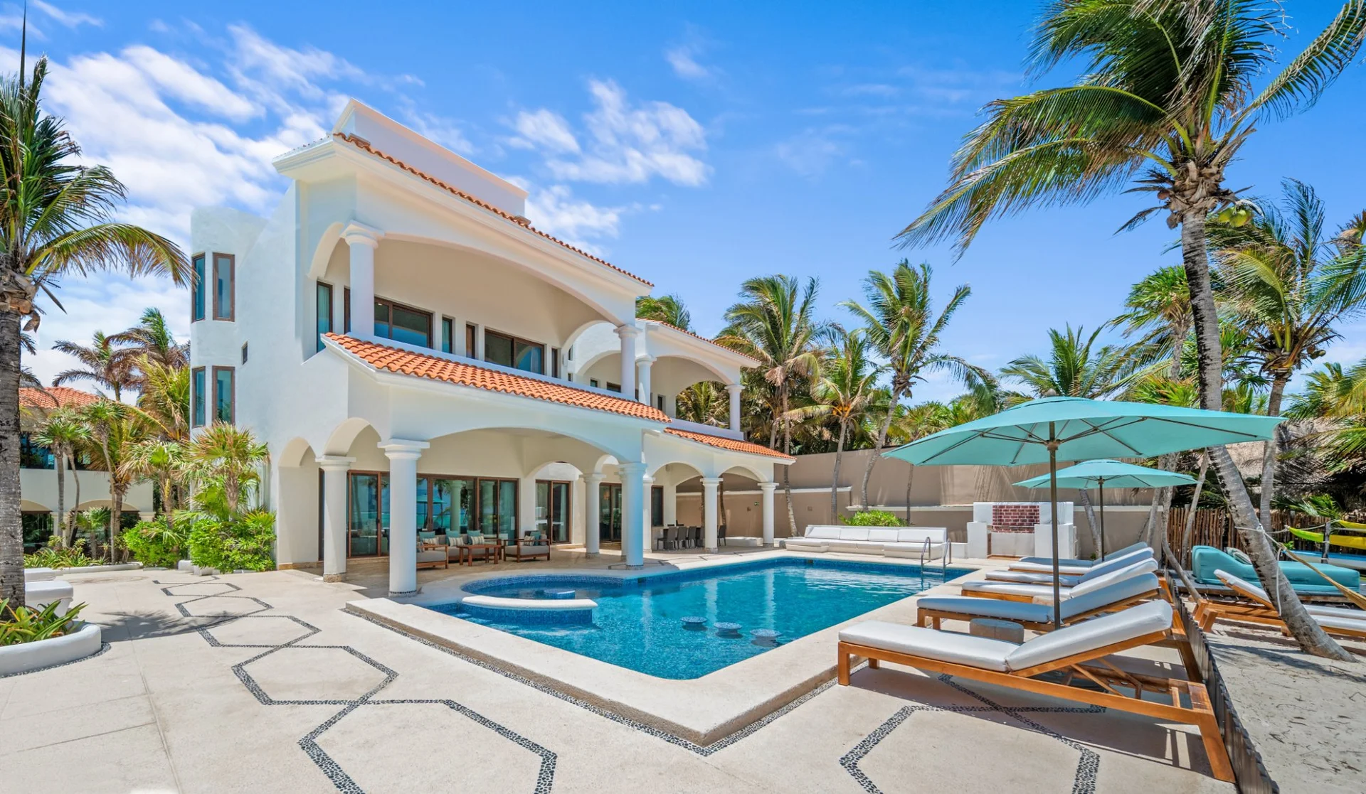 Hacienda Caracol luxury villa with private pool and palm trees, Riviera Maya Tulum
