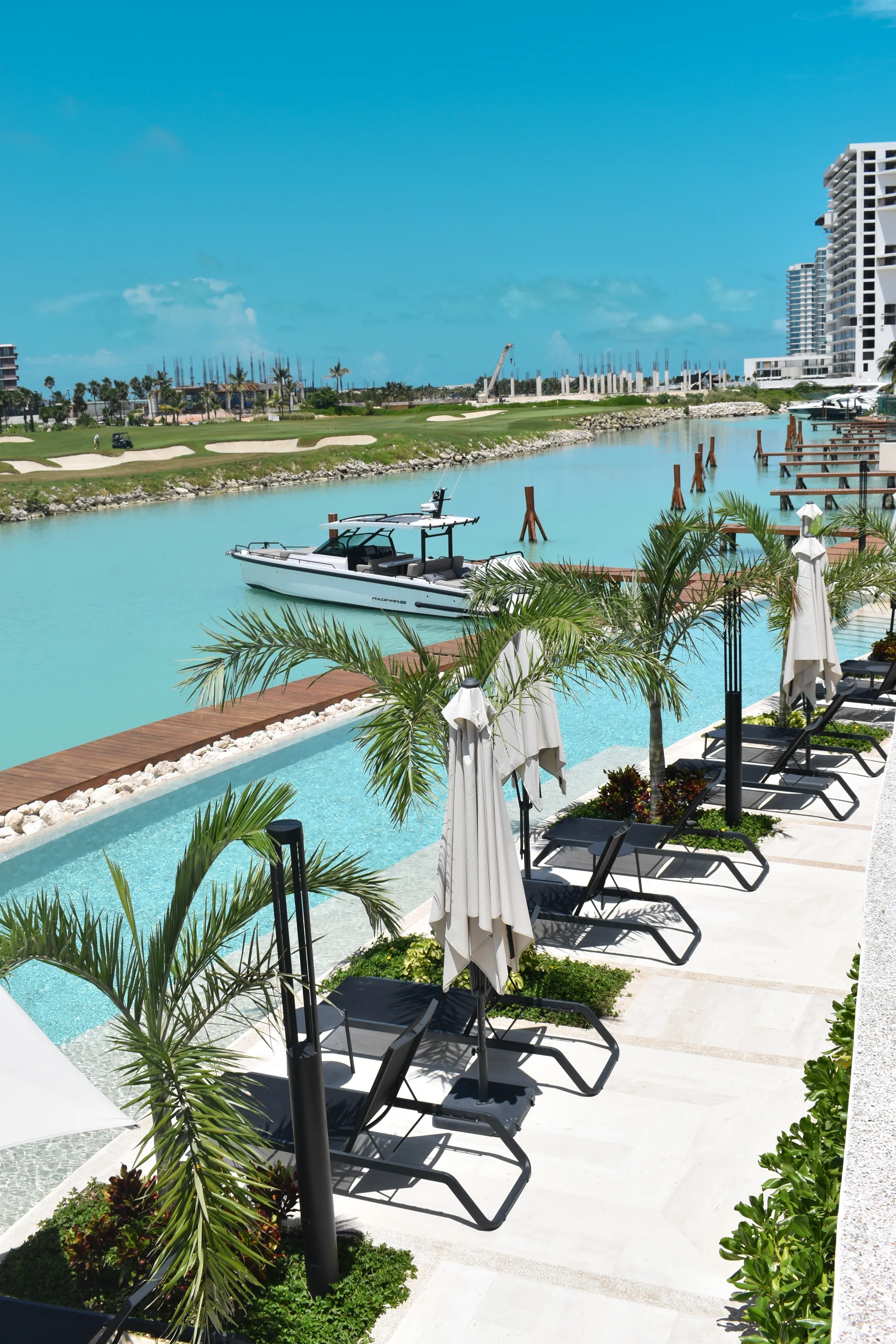 Pool with marina and golf course views - La Vela