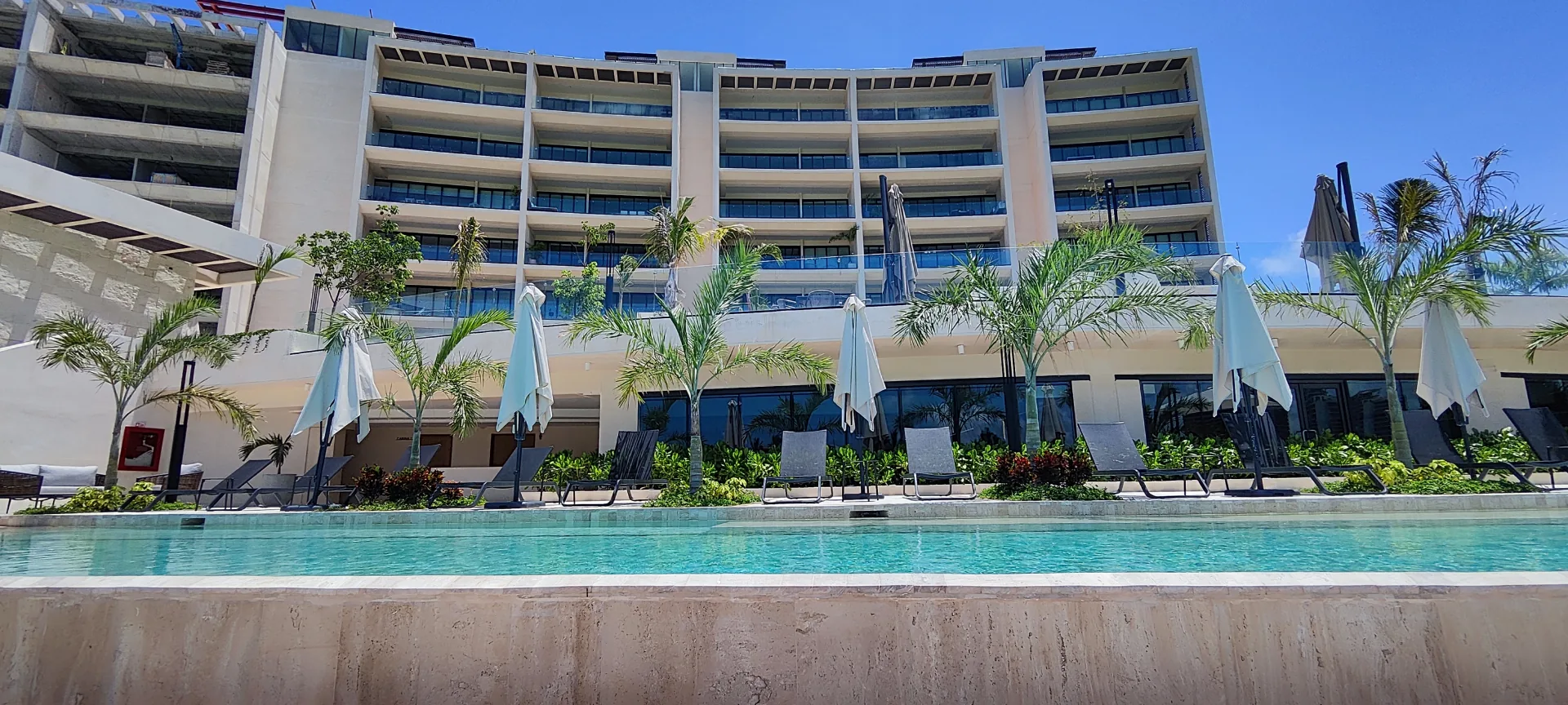 Pool view with building backdrop - La Vela