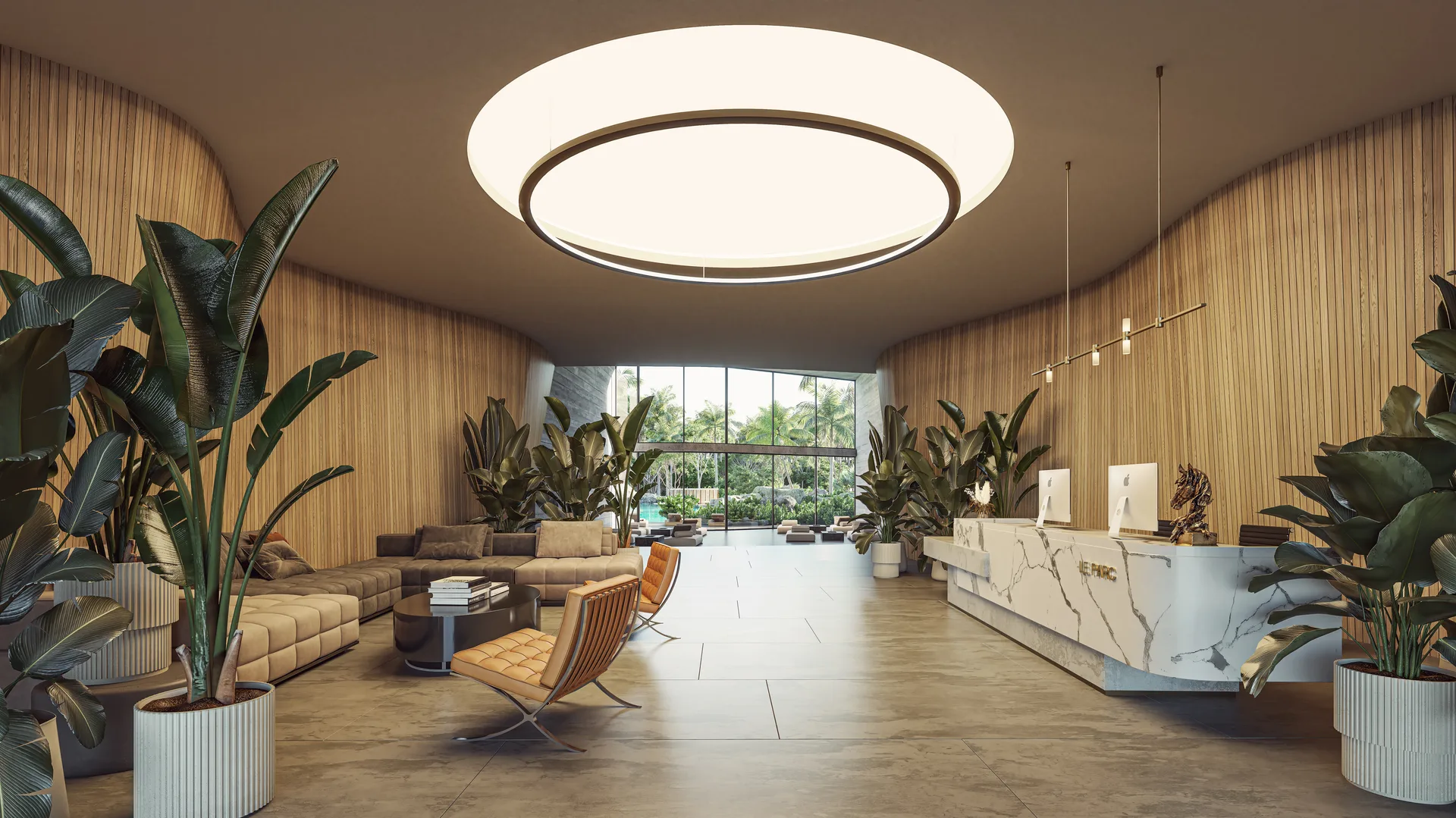 Lobby y recepción con diseño de mármol en Le Parc Cancún