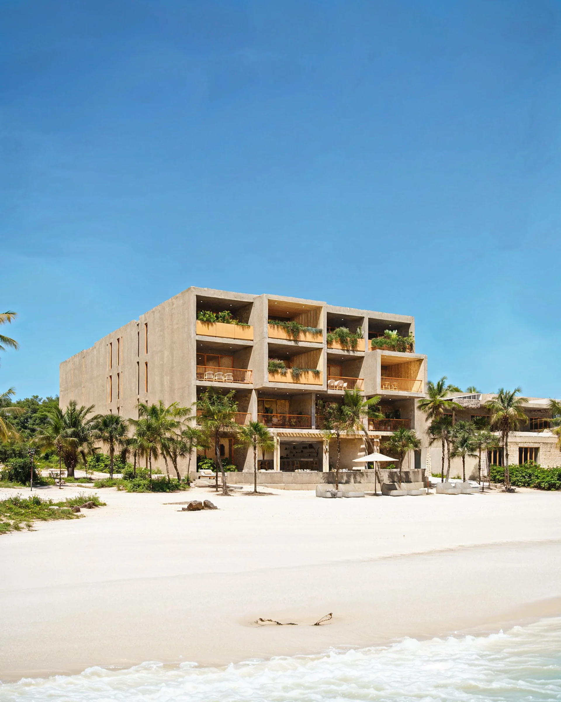 Main Maranta facade in front of the white sand beach at Bahía Soliman, Tulum