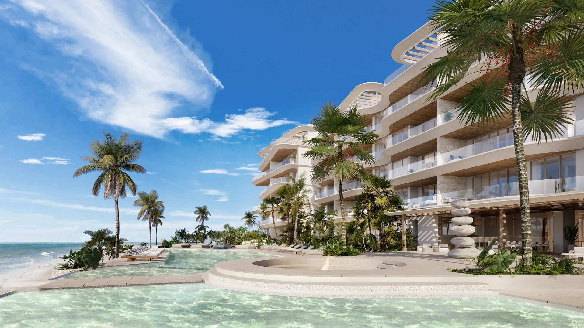 Vista lateral de Marietta con piscina y balcones en Isla Mujeres