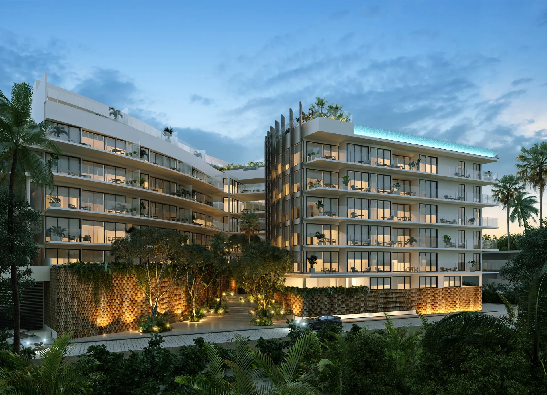 Fachada nocturna iluminada de Marila en Playa del Carmen