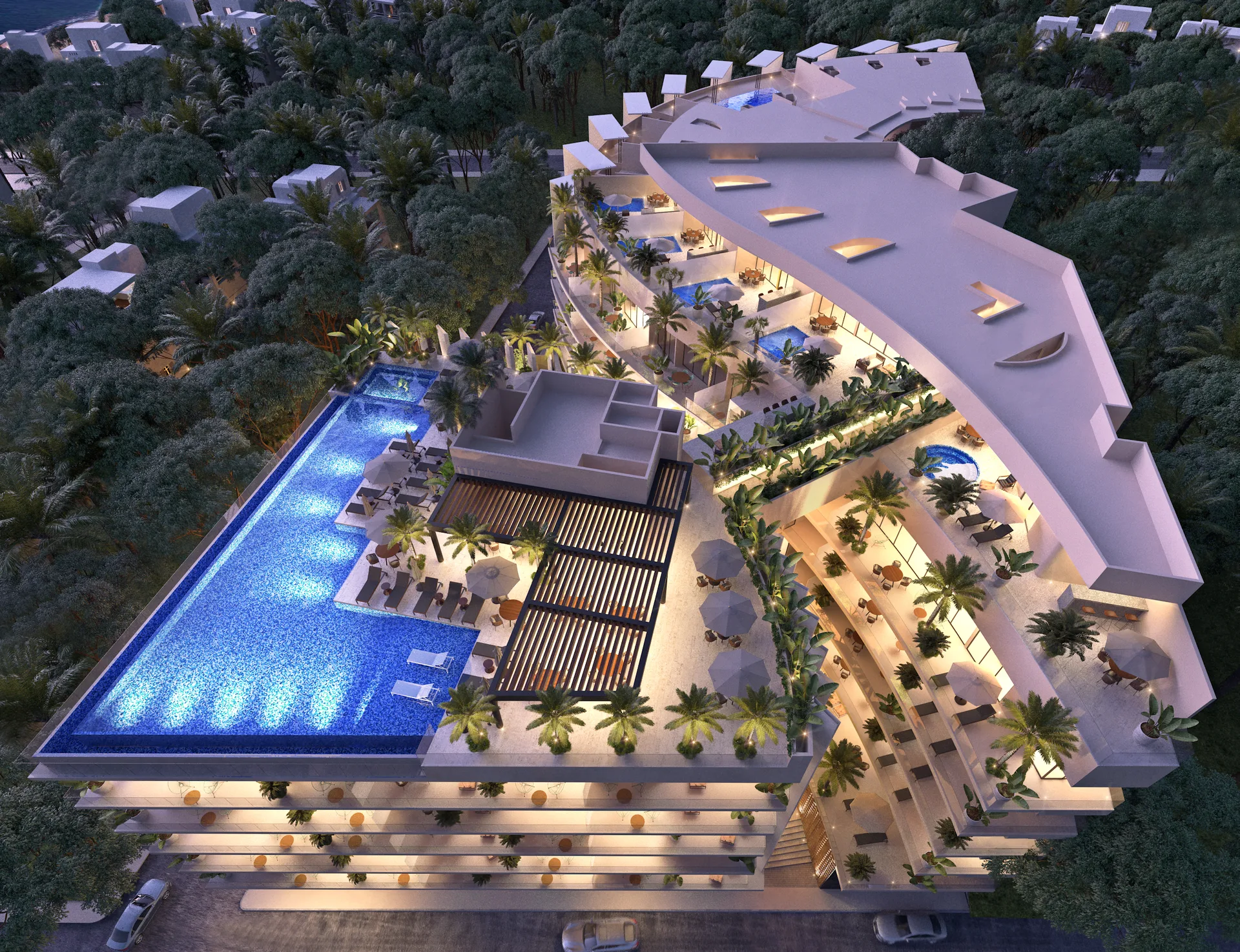 Vista aerea nocturna de la infinity pool en Marila Playa del Carmen