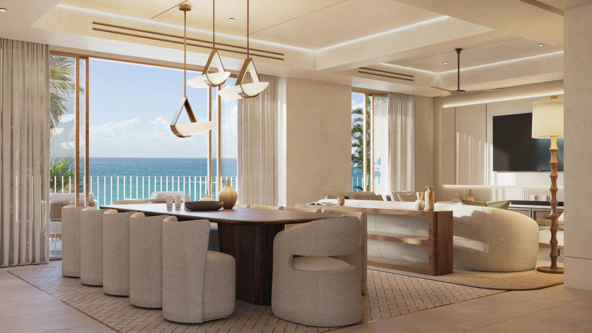 Rendering of a villa's dining and living room with open views of the Caribbean Sea