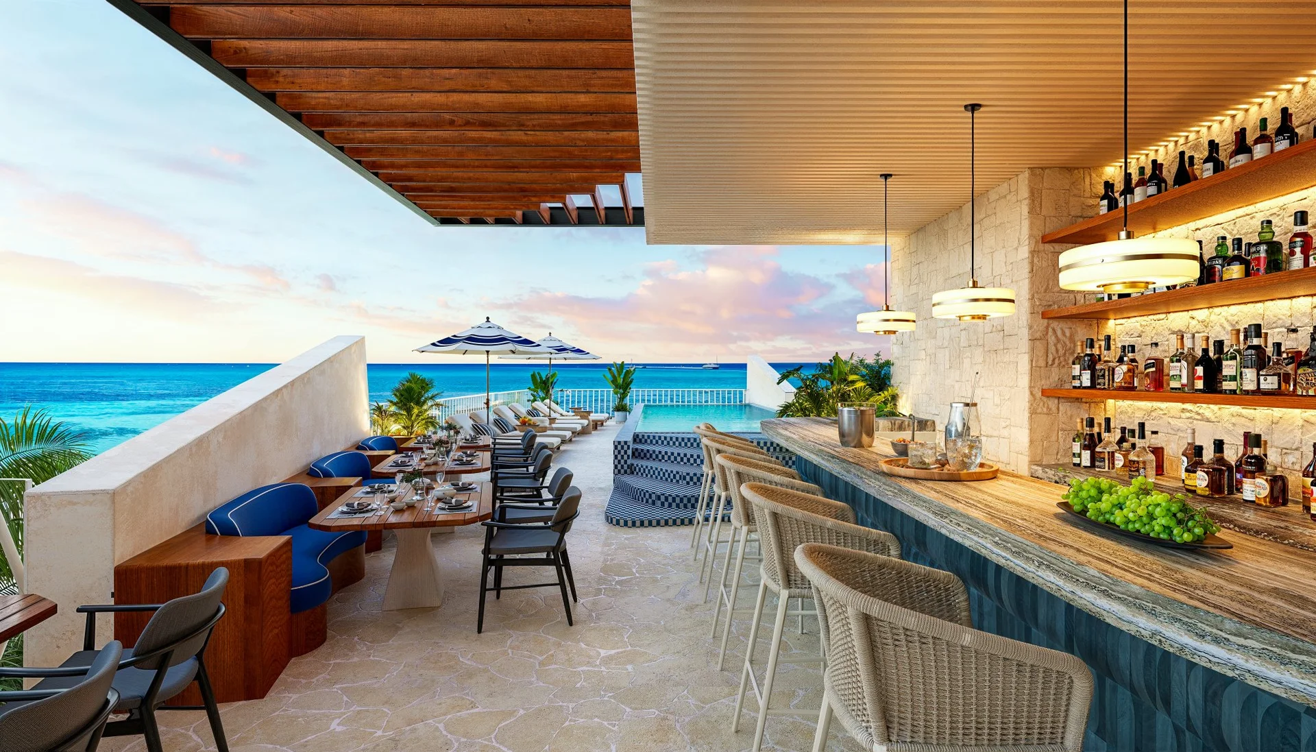 Rooftop bar with pool at sunset at Saint Marine, beachfront apartments Riviera Maya