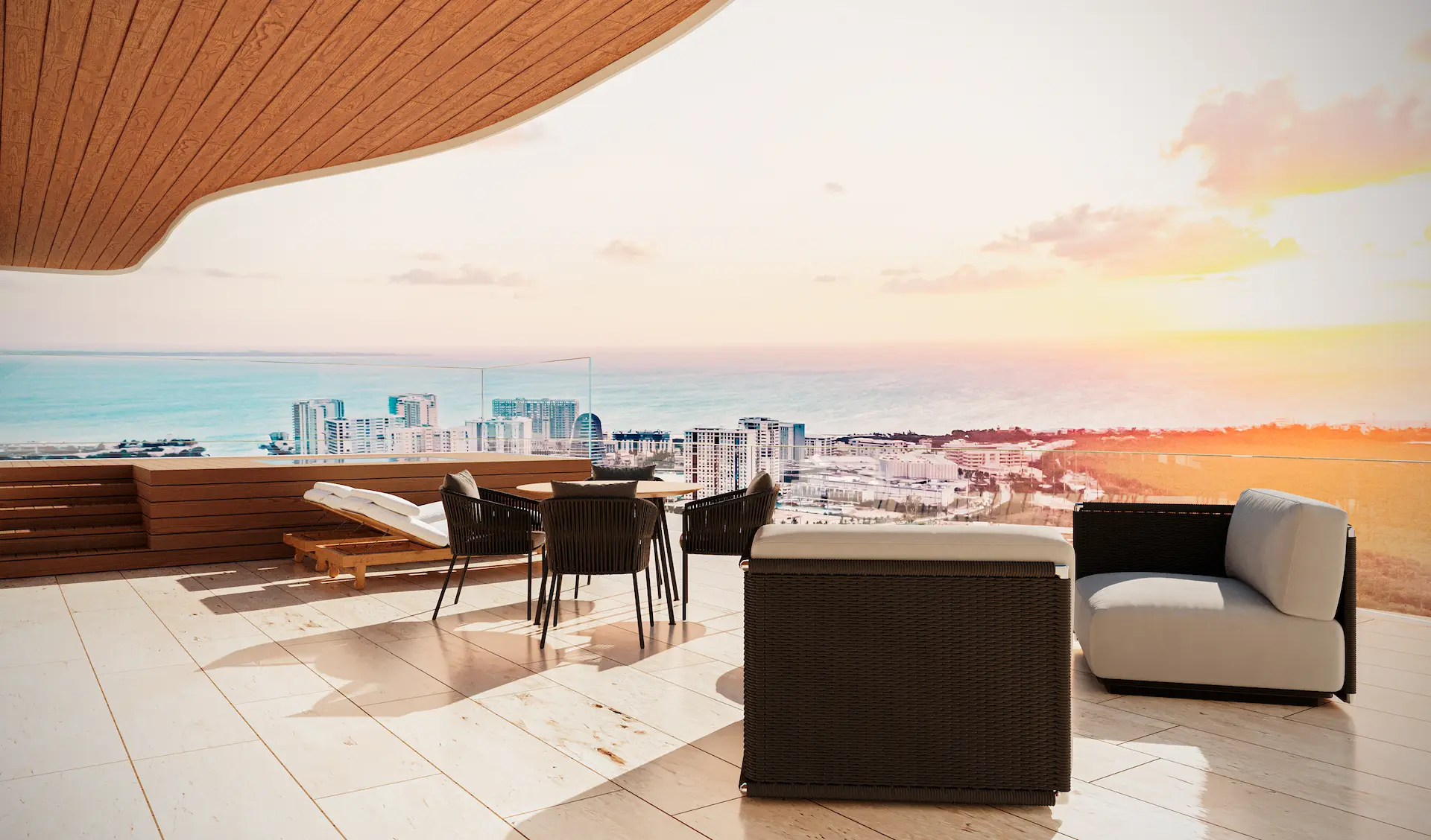 Terraza de penthouse en Torre Insignia Puerto Cancún con vista panorámica al Mar Caribe y zona hotelera al atardecer